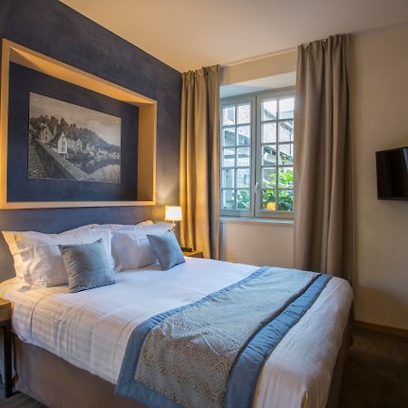 Hotel De L'Abbaye Le Tronchet  Bagian luar foto